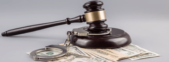 judge's gavel - money - handcuffs